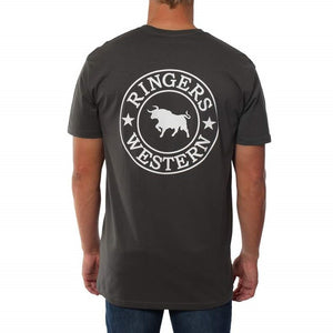 The person is wearing a Ringers Western Signature Bull Original Fit T-Shirt, which is 100% cotton, dark-colored, and features a circular logo on the back with a bull in the center and "Ringers Western" text surrounded by stars. The person is facing away from the camera.