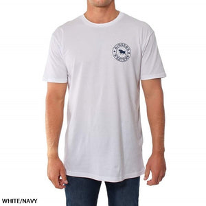 A person is wearing a Ringers Western Signature Bull Original Fit T-Shirt, made of plain white, 100% cotton with a circular logo on the left chest featuring an illustration of a rooster and the text "PINGERS ROOSTER" in navy blue. The comfortable t-shirt is paired with blue jeans against a plain white background.
