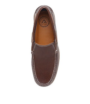 An overhead view of a single brown Colorado Rocana Leather Slip On showcases its white stitching and logo-marked insole, reflecting its heritage.