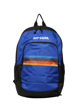 The Rip Curl Ozone 30L School Backpack is made from recycled polyester and features a blue and black design with a multicolored stripe, "RIP CURL" in white, zippered compartments, a laptop section, and adjustable straps for convenience and eco-friendliness.
