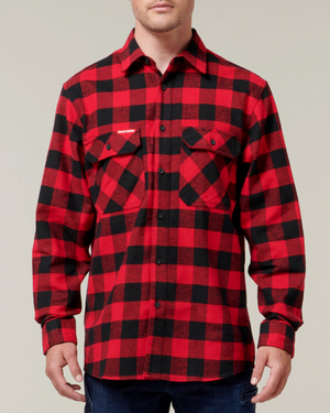 A person wearing a red and black Hard Yakka Check Flannelette Shirt, featuring two buttoned chest pockets and UPF 50+ protection, stands against a plain background. The long-sleeved cotton twill shirt pairs perfectly with their dark blue jeans.
