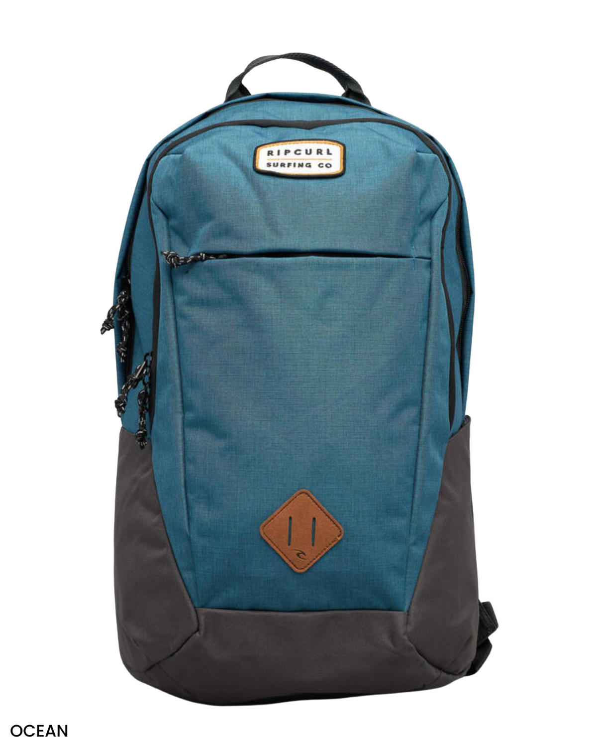 The Rip Curl Overtime 30L Driven Backpack is blue and black, made from recycled polyester, and features a front zip pocket and a brown diamond-shaped patch with the brand logo at the top, offering an eco-friendly and stylish choice for your adventures.