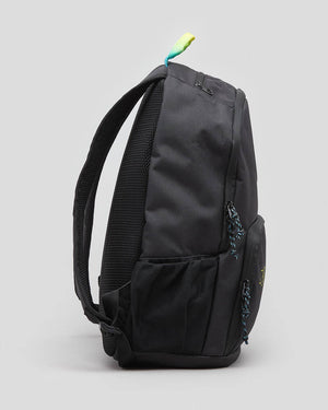 Side view of the black Rip Curl Evo 24L Diamond Eco Backpack, showcasing its multiple compartments including a cooler compartment and mesh side pockets. Blue zipper pulls and a small blue-green handle strap add detail, with adjustable straps ensuring comfort against the plain light grey background.