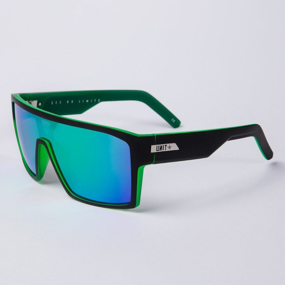 Introducing the UNIT Command Polarised Eyewear: a pair of stylish sunglasses featuring a black and green lightweight frame. The vibrant blue and green polarised lenses reflect light beautifully, while offering UV protection. The thick arms have a slight ergonomic bend for comfort, and the temples are inscribed with "UNIT," embodying a modern and sporty design.