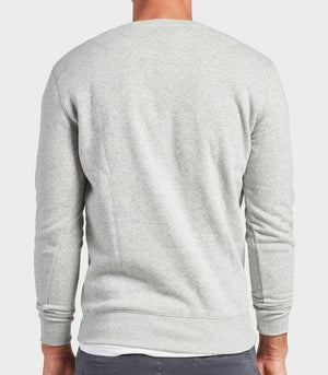 A person is shown from the back wearing a light gray Academy Brand College Crew sweatshirt and dark gray pants against a plain white background.