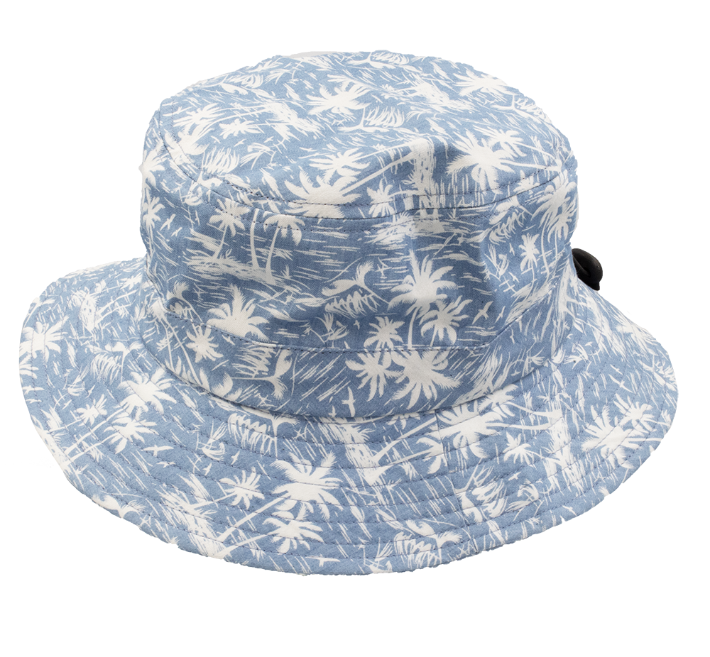 The Avenel Cotton Palm Print Hat in blue and white features palm trees and waves, is lightweight and casual, perfect for summer or beach outings, and offers UPF50+ sun protection.