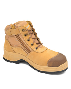 The Blundstone 318 Zip Sided Scuff Cap Safety Boot is a tan and brown high-top work boot inspired by Blundstone, featuring a side zipper and lace-up closure. It includes a steel toe cap, padded ankle support, and a sturdy black and tan sole equipped with SPS Max—XRD® Technology for enhanced durability and comfort.