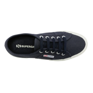 Top view of a dark navy Superga Cotu Classic Sneaker with a white sole and laces, featuring a canvas upper and iconic Superga logos on the side and insole.