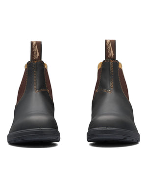 The Blundstone 600 Non Safety Elastic Sided Boots, featuring a blend of brown and black tones, are viewed from the front. These ankle leather boots include pull-on tabs at the back, rugged soles, stitching details around the edges, and impact absorption technology for optimal comfort.