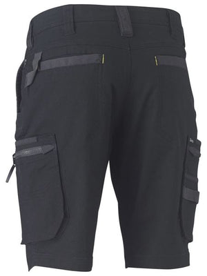 The Bisley Flex & Move Stretch Utility Cargo Short in black features multiple pockets, including two large side cargo pockets with zippers and flaps, as well as smaller front and side pockets. These comfortable shorts are made of durable material with reinforced belt loops and stitching details.