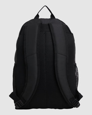 The Billabong Shallows Tao Backpack in black is shown from the back, featuring padded shoulder straps, a top handle, mesh side pockets, a breathable mesh back panel, an internal laptop sleeve, and a 27L capacity.