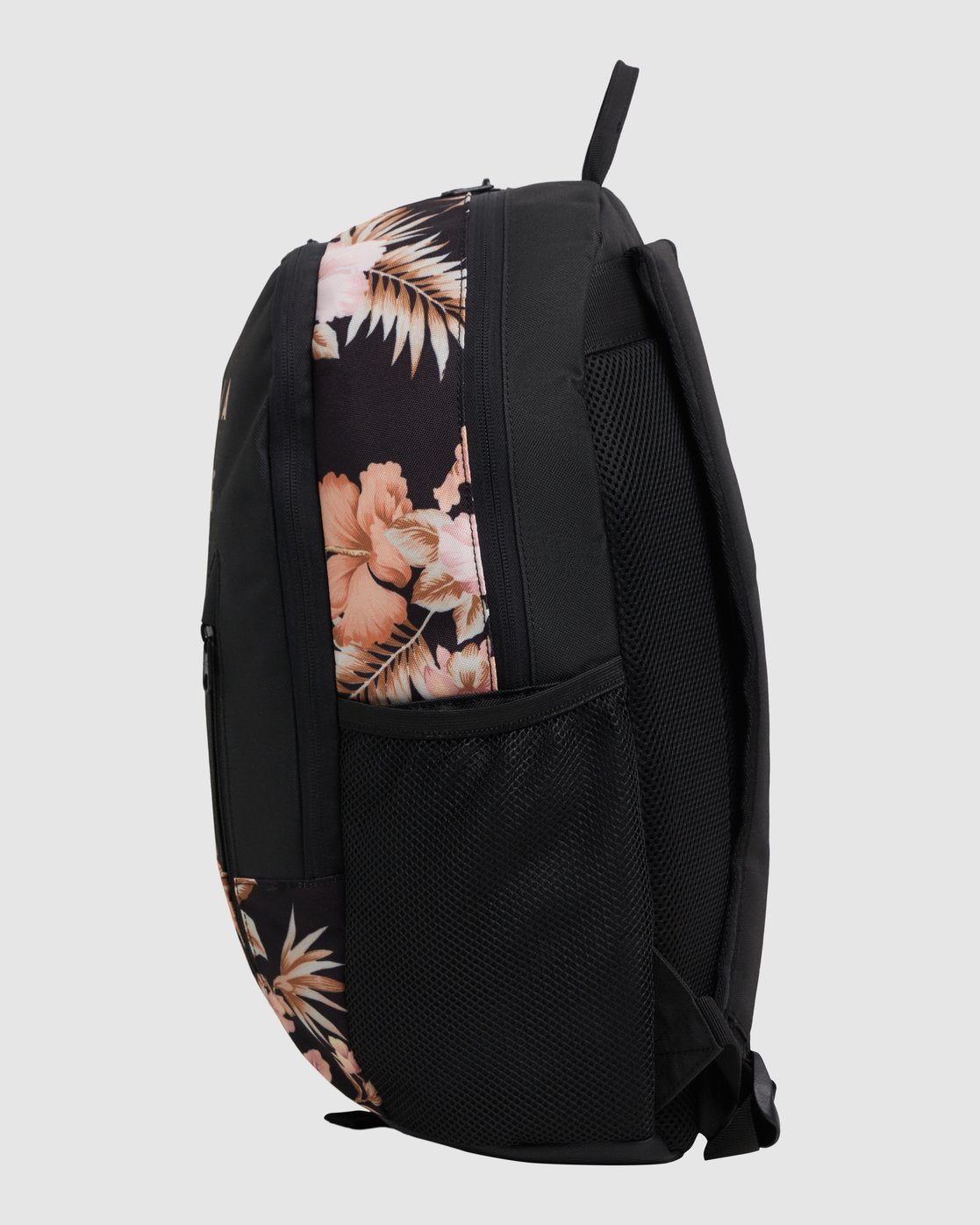 The Billabong Shallows Tao Backpack is a 27L bag with pink and beige floral side panels, a laptop sleeve, black mesh side pocket, and top handle, displayed on a light gray background.