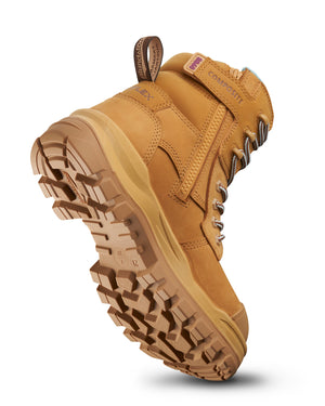 The Blundstone RotoFlex Women's 8860 High Zip Side Safety Boot is shown from below, highlighting its durable tread. This tan, rugged boot features a thick, textured sole, side zipper, and lace-up front for a stylish yet functional design.