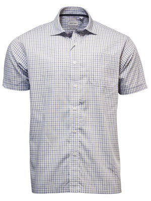 The Back Bay Bamboo Soft Touch Short Sleeve Shirt features a blue and white checked pattern, crafted from a Bamboo/Polyester blend. It includes short sleeves, a button-up front, a pointed collar, and a chest pocket for style and convenience.