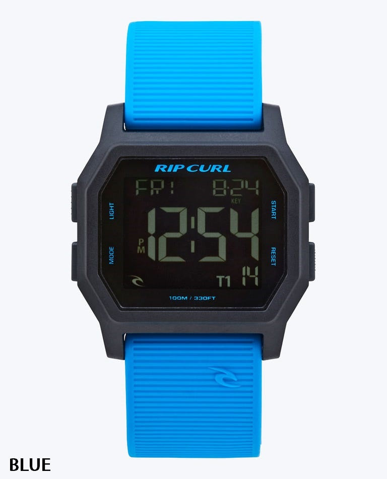 The Rip Curl Atom Digital Watch features a waterproof design, black rectangular face, bright blue textured strap, and displays time, date, day with the Rip Curl logo above the screen.