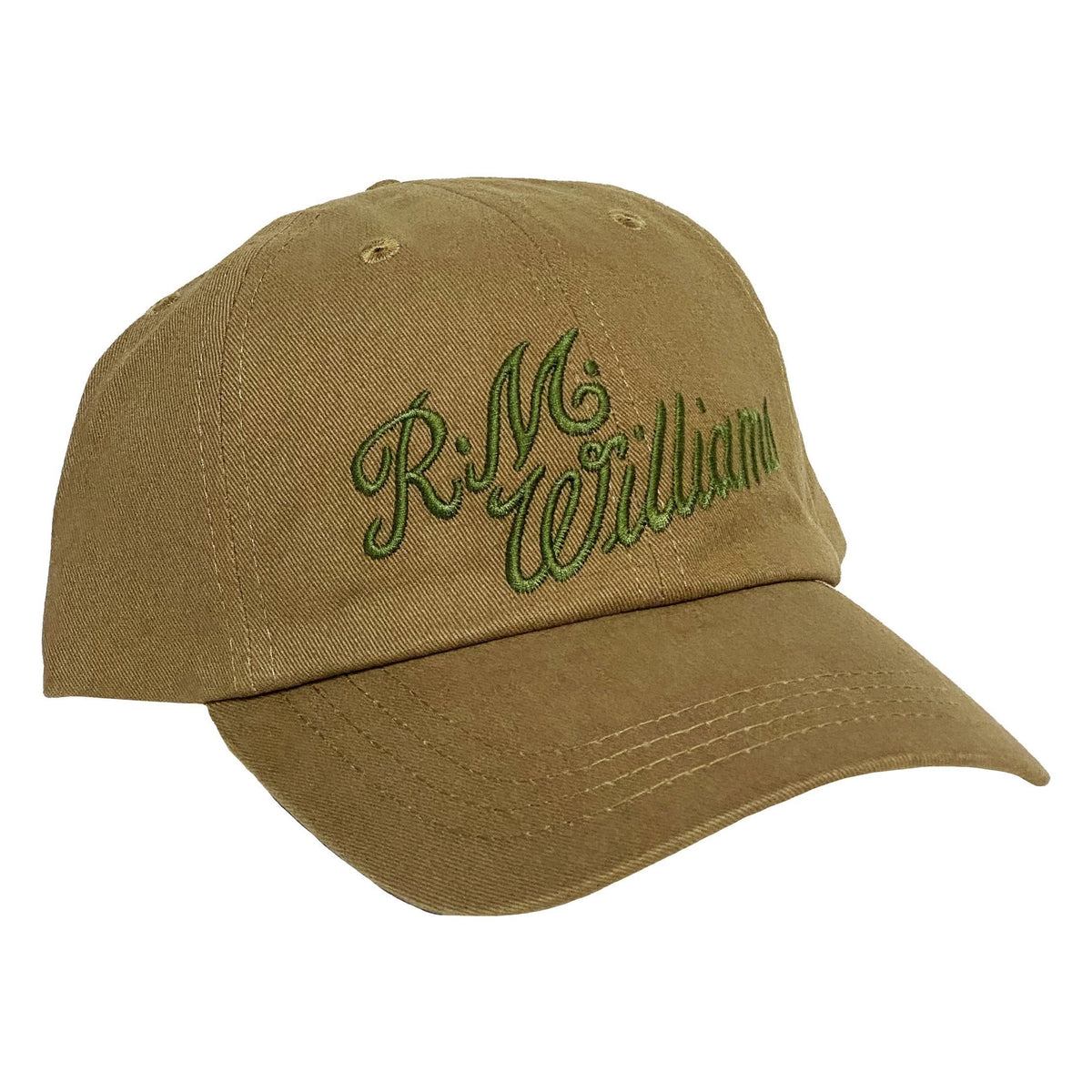 The RM Williams Script Cap is a tan cotton twill baseball cap featuring "R.M. Williams" in green cursive embroidery on the front. It has a classic design with an adjustable strap, curved brim, and offers both style and comfort.