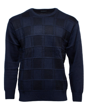 The Ansett Tradewinds Jacquard Crew Knit is a navy sweater with a checkered design of alternating textured and smooth squares, finished with a classic crew neck.
