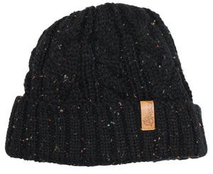 The Anticorp Ladies Twist Lined Beanie is black and knitted, featuring multicolored specks and a brown leather Anticorp label stitched on the folded brim, with a textured logo on the tag.
