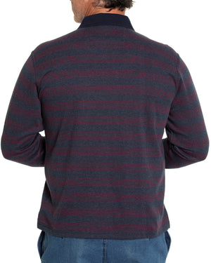 A person wearing the stylish Breakaway Lars Micro Prima Polo with ribbed cuffs and blue jeans is seen from the back. The individual has short hair and is standing with arms bent slightly, hands not visible.