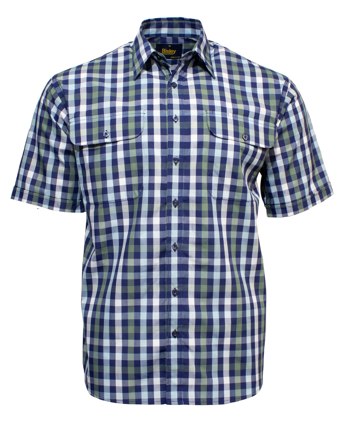 The Bisley Countryman Short Sleeve Shirt is a button-up with a blue, green, and white plaid pattern. Crafted from a durable polyester/cotton blend, it features two breast pockets with button flaps and a collar.