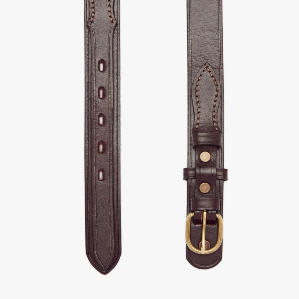 A close-up of the RM Williams Ranger 1 1/4 Belt, crafted from dark brown cowhide leather with stitched detailing, a brass buckle, and multiple adjustment holes, shown against a white background.
