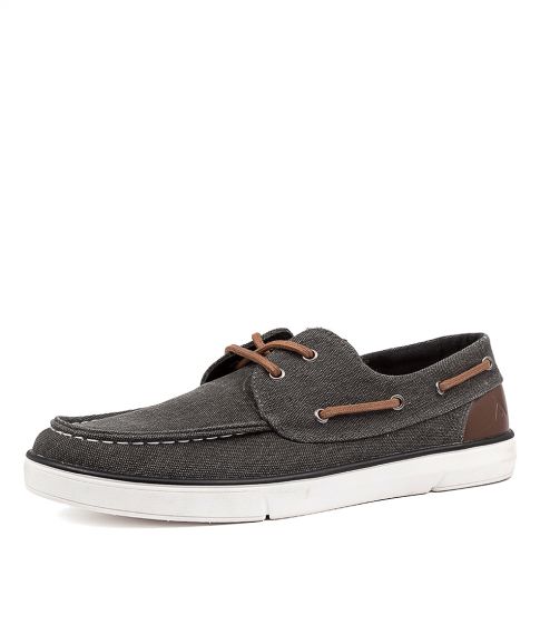 The Colorado Ailon Canvas is a black boat shoe with brown leather laces and detailing, featuring white stitching around the toe. It has a white rubber sole and is displayed against a plain white background, highlighting its craftsmanship.