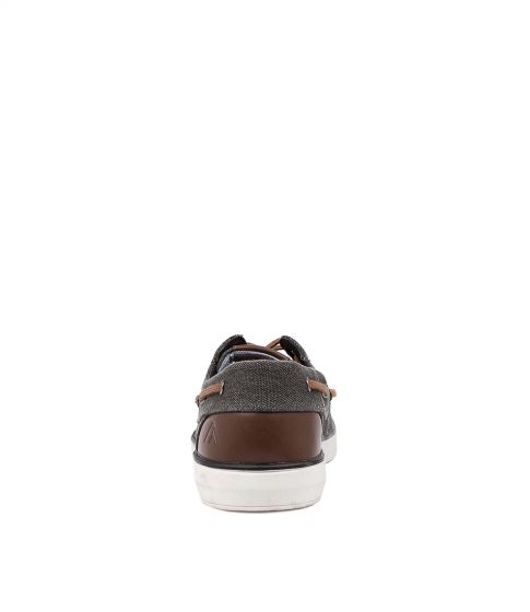 The image displays a casual Colorado Ailon Canvas shoe from the back, featuring a gray upper with brown leather details, a white sole, and visible brown laces. The canvas material enhances its appeal against a plain white background.