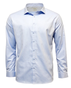 The Seine Dress Shirt is light blue with a long sleeve, button-up design. It features a contemporary fit and subtle geometric print, complemented by a classic collar, shown on a plain white background.