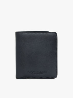 The RM Williams Urban Bi-Fold is a black, full-grain leather wallet with a simple and sleek design. It features an embossed inscription near the bottom on the front, reading "R.M. Williams" and "Est 1932 Australia" in small, capitalized letters. The wallet looks brand new and is showcased against a plain white background in the photograph.