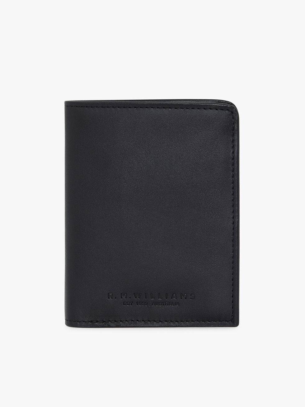 A closed, black RM Williams Urban Small Slim Tri-Fold wallet in full grain leather with subtle stitching and the RM Williams logo embossed on the front, displayed against a plain white background.