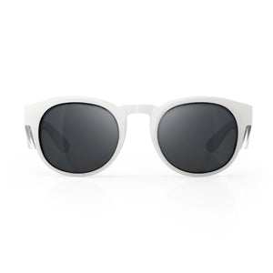 The SafeStyle Cruisers sunglasses feature white polycarbonate frames and round, polarized lenses against a white background. The broad temples taper stylishly, offering UV400 protection and a slightly glossy finish.