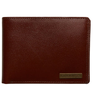 The Rusty High River Leather Wallet is a closed men's wallet made from smooth full grain brown leather, featuring a small rectangular gold metal plate at the bottom right corner.