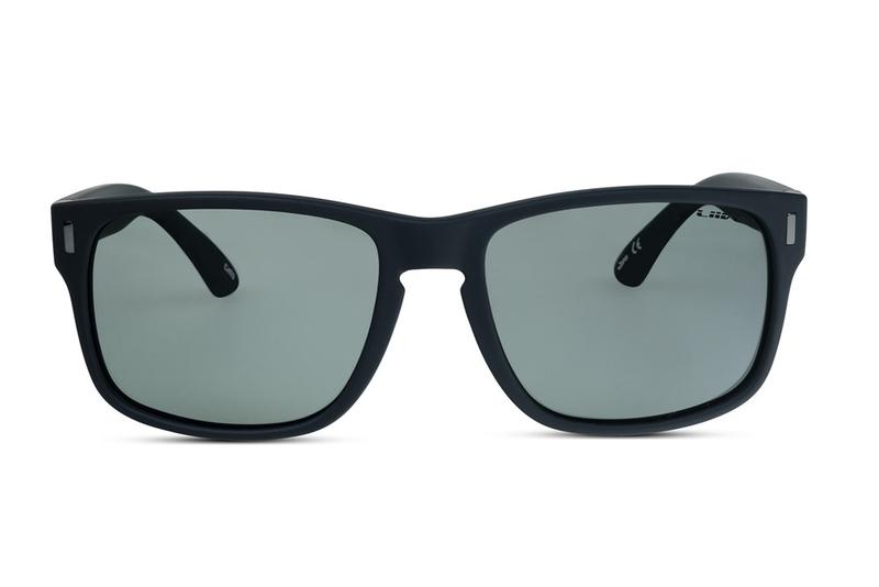 The Liive The Lewy Polar Sunglasses are showcased against a pristine white background, featuring rectangular black frames with dark tinted lenses. These sunglasses boast thick, matte-finished frames made from lightweight polycarbonate material. The earpieces gently curve at the ends for a comfortable fit, ensuring both style and ease of wear.