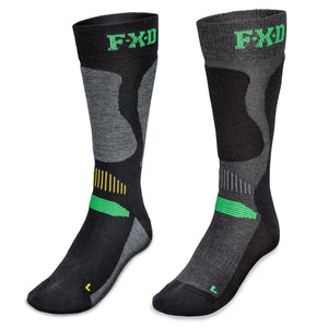 Image of two FXD SK-7 Tech Socks in black and gray with green and yellow accents, designed for optimal support and comfort. The ergonomic design features reinforced areas, moisture-wicking fabric, and the letters "FXD" woven at the top. Each sock is marked with an "L" for the left foot.