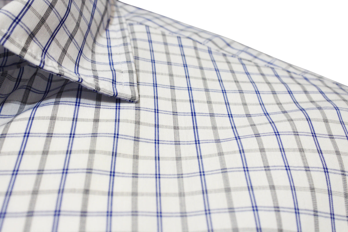 The Back Bay Bamboo Soft Touch Short Sleeve Shirt showcases a grid pattern with thin blue and thicker black lines. Its white fabric is a crisp Bamboo/Polyester blend, featuring a collar for versatility and short sleeves for a relaxed vibe.