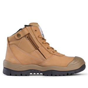 The Mongrel ZipSider Safety Boot Scuff Cap 461050 is a tan-colored work boot with a rugged design, featuring a side zipper, metal eyelets, and a thick, durable black sole. It includes a padded collar and reinforced steel toe cap for added protection. This slip-resistant boot is made with a combination of leather and synthetic fabric.