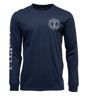 The Pilbara Long Sleeve T-Shirt is a navy blue casual shirt made from 100% cotton, featuring a round logo on the chest with a lighthouse and "Hilbay Collection" text; the sleeve has "Hilbay" printed in white, styled like a classic Ritemate T-shirt.