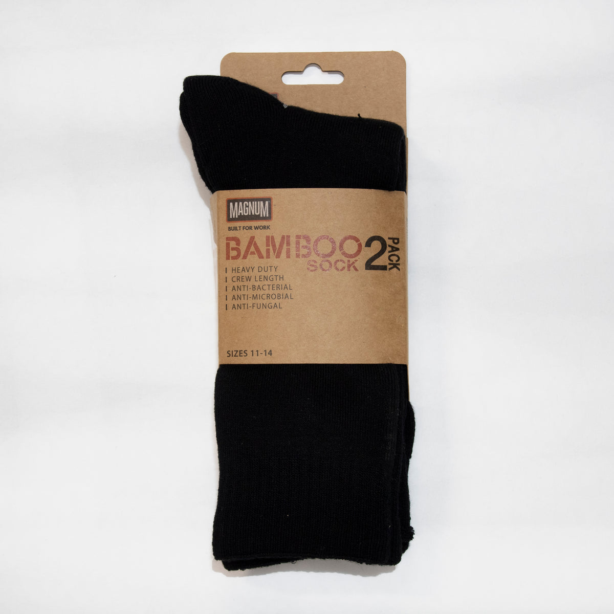 A pack of two black bamboo socks with cushioned footbed comes with a brown cardboard label reading "Magnum Heavy Duty Bamboo 2pk Socks," featuring crew length, anti-bacterial and anti-fungal properties. Suitable for sizes 11-14.