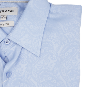 The Gerase Paisley Print Dress Shirt is a folded, light blue, long-sleeved garment in size "M" with a "Body Fit." It features a collar, buttons, and smooth bamboo fiber fabric.
