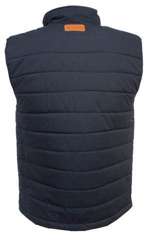 A back view of the Ritemate Pilbara Reversible Vest in navy blue is shown, highlighting its horizontal quilted stitching and high collar. Near the top of the vest's back, a rectangular brown leather patch with a logo is sewn on. This comfortable vest features a versatile reversible design.