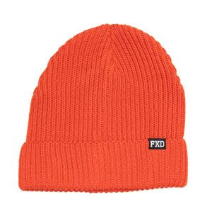 The FXD CP-9 Beanie is an orange knit beanie with a folded brim and rib knit design. A small black and white rectangular patch with the letters "FXD" is sewn onto the front of the folded section. Crafted from recycled polyester, this beanie offers both style and sustainability.