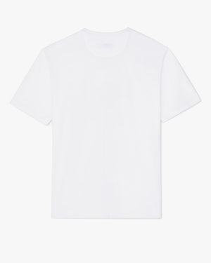 The RM Williams Script Stamp T-Shirt, a classic plain white tee made of 100% cotton, is shown against a light gray background, with the front view featuring the subtle R.M.Williams script logo for understated elegance.