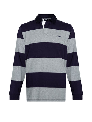 The RM Williams Tweedale Rugby is a long-sleeved, collared shirt made from heavyweight jersey knit, featuring broad horizontal stripes in alternating dark blue and heather gray. Crafted from 100% cotton, the jumper includes a small embroidered logo on the left chest and a contrast black collar.