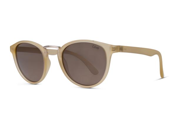 The Liive Feline Polar Sunglasses feature a beige frame with round, dark tinted lenses providing UV protection. The brand name "Liive" is visible on the left lens. These stylish sunglasses also include a metal bridge and matching beige temples.