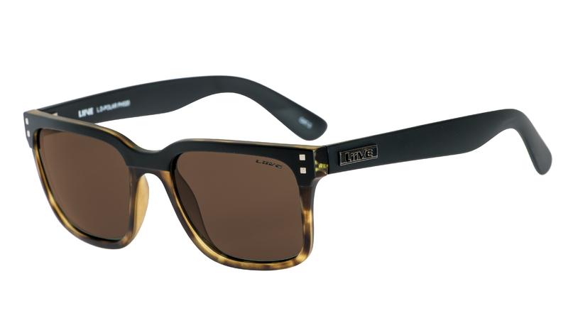 Introducing the Liive L.D Polar Sunglasses: a sleek pair of sunglasses featuring a tortoiseshell frame at the front and black arms. Equipped with UV protection and brown polarized lenses, these sunglasses also display a metallic brand logo on the temples.