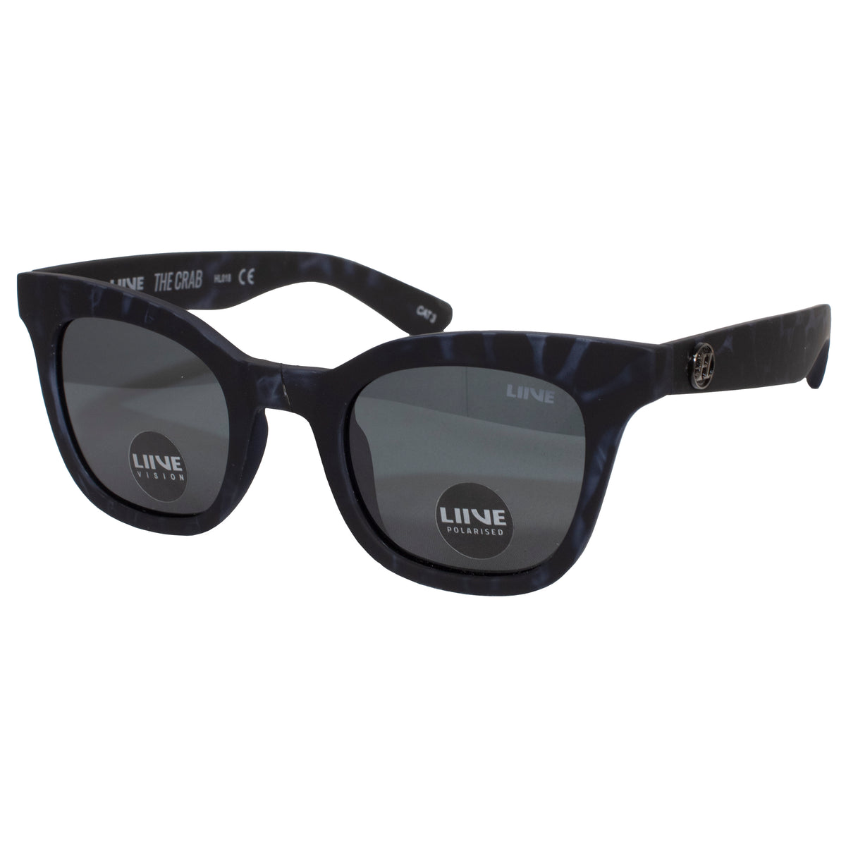 Black and gray tortoiseshell Liive The Crab Polar Sunglasses with square, Grey Polarised lenses featuring "LiiVE - THE CRAB" on the inside arm and "LiiVE POLARISED" on the lens. These sunglasses showcase a matte Black Tort frame with a solid, sturdy build.