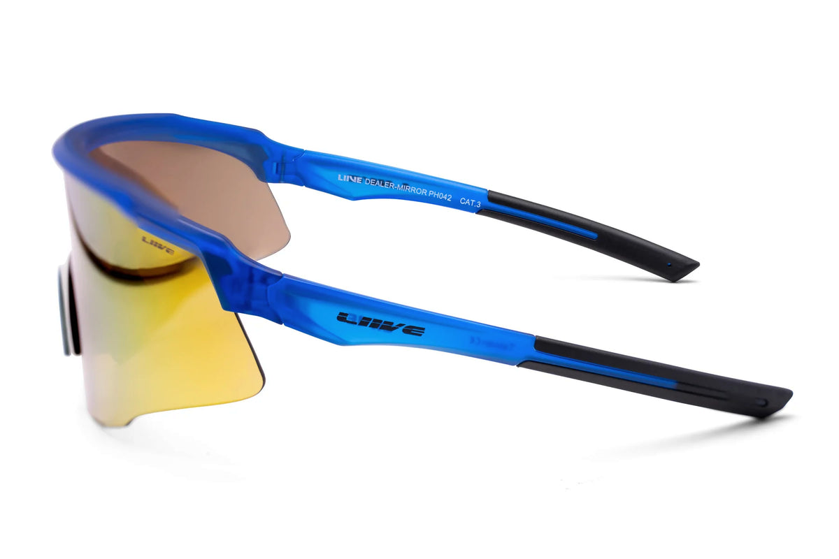 Liive Dealer Mirror Sunglasses feature a sleek modern design with blue frames, mirrored yellow lenses, and black earpieces. They're crafted from lightweight polycarbonate for durability and UV protection, perfect for athletic activities. The frame side displays "LIVE.