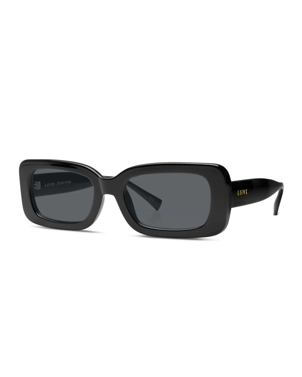 The Liive Crush Sunglasses are a pair of sleek black rectangular shades with UV protection and dark lenses. The frame showcases a subtle gold "Liive" logo on the temples, offering a modern and stylish look. These chic sunglasses are the perfect accessory for sun protection.