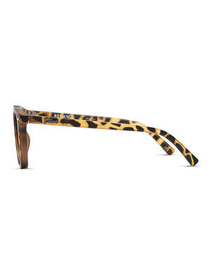 Side view of the Liive Berawa Polar Sunglasses with a tortoiseshell pattern, featuring polarized lenses and "BE RAW" and "foster grant" inscribed on the temples.