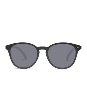 Liive Berawa Polar Sunglasses featuring black, slightly rounded frames with polarized lenses and subtle metallic hinge details are displayed against a white background, offering style and UV protection.